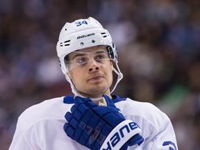 Toronto Maple Leafs' Auston Matthews prepares to take a face-off against the Vancouver Canucks during the first period of an NHL hockey game in Vancouver, B.C., on Saturday December 2, 2017. THE CANADIAN PRESS/Darryl Dyck