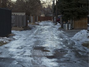 Slippery street and back alleys have made for poor driving conditions in some areas on Sunday, Dec. 17, 2017 in Edmonton. Greg Southam / Postmedia