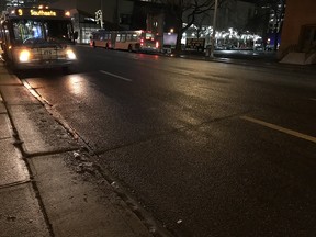 The wet roads of downtown Edmonton on December 15, 2017. Nathan Martin/Postmedia