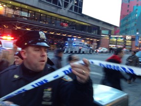 Police respond to a report of an explosion near Times Square on Monday, Dec. 11, 2017, in New York. (AP Photo/Charles Zoeller)