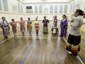 Dancers compete in the Kiwanis girls' jingle in the gym of Ben Calf Robe school in this file photo.