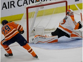 Edmonton Oilers forward Leon Draisaitl scores a short-handed goal against the Philadelphia Flyers' Brian Elliott in Edmonton on Wednesday, Dec. 6, 2017.