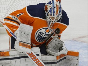 Edmonton Oilers goalie Laurent Brossoit makes a save during NHL game action against the Toronto Maple Leafs in Edmonton on November 30, 2017.