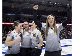 Skip Rachel Homan of Ottawa pumps her fists as second Joanne Courtney, left, third Emma Miskew and lead Lisa Weagle celebrate defeating Team Carey in the 2017 Roar of the Rings Canadian Olympic Trials final in Ottawa on Sunday, Dec. 10, 2017.