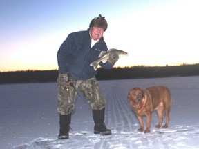 Neil and Penny with a merry little walleye.