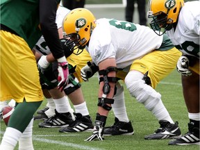 Simeon Rottier takes part in an Edmonton Eskimos team practice at Commonwealth Stadium on June 10, 2014.