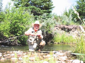 Neil with a "Mississippi" Battle Creek rainbow trout