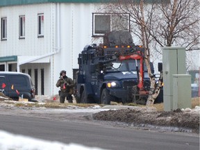 Police tactical units at the scene of an "unfolding incident" in an industrial area of Sherwood Park Tuesday, Dec. 12, 2017.