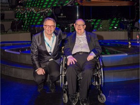 Cam Tait is joined by Singing Christmas Tree director John Cameron on the set of the production at the Jubilee Auditorium in Edmonton on Friday, December 15, 2017. (Rod Hislop photo)