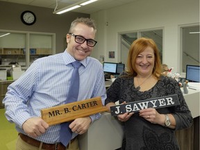 Shauna May Seneca School principal Bob Carter, left, and Jan Reimer School principal Jan Sawyer share office space in Jan Reimer School while construction crews put the finishing touches on the Shauna May Seneca School building.