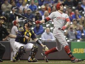 Cincinnati Reds' Joey Votto hits a home run during the first inning of a baseball game against the Milwaukee Brewers Wednesday, Sept. 27, 2017, in Milwaukee. Given Canada's love for all things hockey, Cincinnati Reds star Joey Votto was as surprised to win the Lou Marsh Trophy a second time as he was the first. (THE CANADIAN PRESS/AP, Morry Gash)