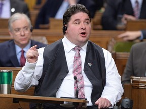 Minister of Veterans Affairs and Associate Minister of National Defence Minister Kent Hehr responds to a question during question period in the House of Commons on Parliament Hill in Ottawa on Thursday, April 14, 2016.