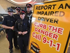 Police from the traffic safety section attended a news conference with city officials and partners to raise awareness of the issue of impaired driving in Edmonton, December 7, 2017.