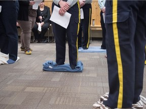 RCMP cadets participate in the Kairos blanket exercise at the Depot Division in Regina, Sask.