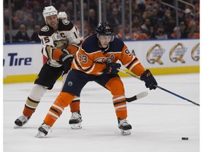 Edmonton Oilers forward Ryan Nugent-Hopkins (93) carries the puck against Anaheim Ducks' Ryan Getzlaf (15) at Rogers Place in Edmonton on Thursday, Jan. 4, 2018. (David Bloom)