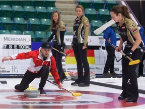 Canadian country and western signer Brett Kissel takes part in an on-ice curling experience with Team Canada's Rachel Homan in between practices during the Meridian Canadian Open Grand Slam of Curling in Camrose on Friday, Jan. 19, 2018.