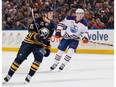 Connor McDavid #97 of the Edmonton Oilers skates against Jack Eichel #15 of the Buffalo Sabres at First Niagara Center on March 1, 2016 in Buffalo, New York. Jen Fuller / Getty Images