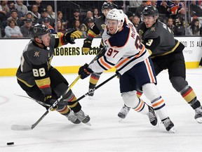 Connor McDavid #97 of the Edmonton Oilers shoots against Nate Schmidt #88 of the Vegas Golden Knights in the first period of their game at T-Mobile Arena on January 13, 2018 in Las Vegas, Nevada.