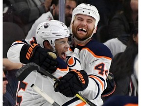 LAS VEGAS, NV - JANUARY 13:  Darnell Nurse #25 and Zack Kassian #44 of the Edmonton Oilers celebrate after Nurse scored an overtime goal against the Vegas Golden Knights to win their game 3-2 at T-Mobile Arena on January 13, 2018 in Las Vegas, Nevada.