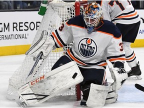 Cam Talbot #33 of the Edmonton Oilers blocks a Vegas Golden Knights shot in the second period of their game at T-Mobile Arena on January 13, 2018 in Las Vegas, Nevada. The Oilers won 3-2 in overtime.