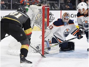 Cam Talbot #33 of the Edmonton Oilers blocks a shot by Jonathan Marchessault #81 of the Vegas Golden Knights as Andrej Sekera #2 of the Oilers defends in the second period of their game at T-Mobile Arena on January 13, 2018 in Las Vegas, Nevada. The Oilers won 3-2 in overtime.