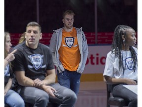 Connor McDavid walks onto the ice to big cheers from the 2,400 junior-high students at Rogers Place during the third edition of Hockey Helps Kids, which launched the Charity Cup Challenge on Janu. 31, 2018, in Edmonton. Five schools paired with an Oilers player to promote local charities. The students made videos to compete in online voting to be eligible for a $25,000 grand prize (Shaughn Butts)