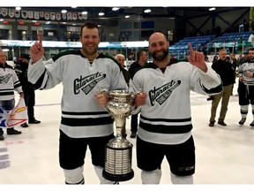 Matt Sefanishion, right, poses with Grand Falls-Windsor Cataracts teammate Derick Martin after the club claimed the 2017 Allan Cup in Bouctouche, N.B. The best senior amateur men's hockey teams from across Canada have competed for the Allan Cup every year since 1909, except for 1945, when play was suspended during the war effort. (File)