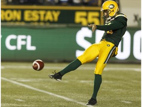 Edmonton's Hugh O'Neill (70) kicks the ball during the first half of a CFL football game between the Edmonton Eskimos and the Winnipeg Blue Bombers at Commonwealth Stadium in Edmonton, Alberta on Saturday, September 30, 2017. Ian Kucerak / Postmedia