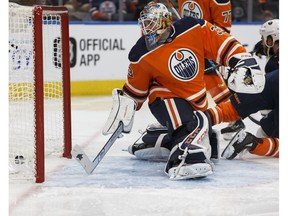 Edmonton's goaltender Cam Talbot (33) is scored on by Buffalo's Ryan O'Reilly (12) during the second period of an NHL game between the Edmonton Oilers and the Buffalo Sabres at Rogers Place in Edmonton, Alberta on Tuesday, Jan. 23, 2018. Photo by Ian Kucerak Photos for copy in Wednesday, Jan. 24 edition