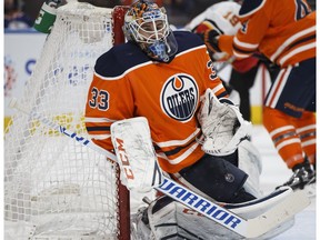 Edmonton's goaltender Cam Talbot (33) makes a save during the second period of a NHL game between the Edmonton Oilers and the Calgary Flames at Rogers Place in Edmonton, Alberta on Thursday, Jan. 25, 2018. Photo by Ian Kucerak