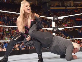 Natalya putting Ric Flair in the Sharpshooter on Monday Night Raw in 2015.