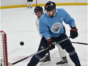 Oilers Anton Slepyshev (58) and Iiro Pakarinen (26) during practice at Rogers Place in Edmonton, January 30, 2018.
