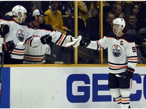 Edmonton Oilers center Connor McDavid (97) is congratulated after scoring a goal against the Nashville Predators on Tuesday, Jan. 9, 2018, in Nashville, TN.