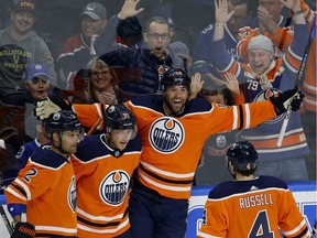 Edmonton Oilers Patrick Maroon (19) celebrates his first-period goal against the Vancouver Canucks in Edmonton on Saturday, Jan. 20, 2018.