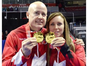 Team Koe skip Kevin Koe and Team Homan skip Rachel Homan, seen here celebrating their wins at the 2017 Roar of the Rings Olympic Curling Trials in Ottawa, were both bumped in Saturday's playoffs of the Pinty’s Grand Slam Series $250,000 Canadian Open in Camrose on Jan. 20, 2018. (File)