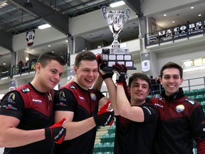 (Left to right) Benoit Schwartz, Valentin Tanner, Claudio Paetz, and Peter de Cruz celebrate winning Meridian Canadian Open Men's final in Camrose, Alta. on Sunday January 21, 2018. De Cruz won 5-3.