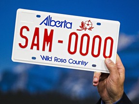 Alberta Premier Jim Prentice speaks about the licence plate situation at the Alberta Legislature Building in Edmonton, Alta., on Thursday, Sept. 18, 2014. Prentice said there will be no new licence plates. Codie McLachlan/Edmonton Sun/QMI Agency