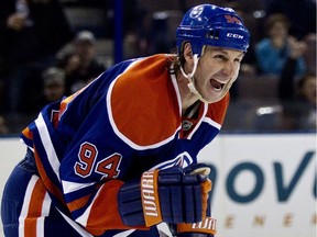 Edmonton's Ryan Smyth celebrates Shawn Horcoff's goal on Vancouver's goalie Cory Schneider during the second period of the Edmonton Oilers NHL hockey game against the Vancouver Canucks at Rexall Place in Edmonton on Sunday, February 19, 2012.