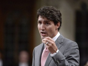 Prime Minister Justin Trudeau rises during Question Period in the House of Commons on Parliament Hill in Ottawa on Oct. 4, 2017. THE CANADIAN PRESS/Adrian Wyld