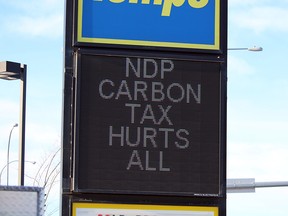 A Tempo station sparked controversy with a sign directing profanity at the Alberta NDP and the prime minister. Jesse Cole/Postmedia