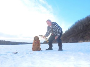 Neil and Penny with a Wizard Lake "hammer handle" pike.