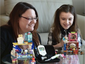 With her diabetes kit in the foreground, Deanna Emberg's seven-year-old daughter Natalie, who has diabetes, took seven months with the St. Albert public school board, to get her daughter insulin injections in her school.