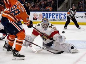 The Edmonton Oilers Jesse Puljujarvi (98) is stopped by the Florida Panthers' goalie James Reimer (34) during second period NHL action at Rogers Place in Edmonton Monday Feb. 12, 2018.
