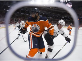 Edmonton Oilers forward Jujhar Khaira (16) battles the Los Angeles Kings' Tyler Toffoli (73) at Rogers Place in Edmonton on Jan. 2, 2018. The Oilers lost 5-0. (File)