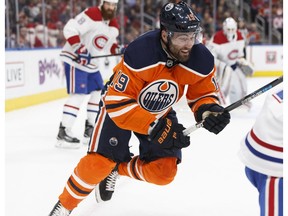 Edmonton Oilers forward Patrick Maroon races after Montreal's Brendan Gallagher (11) during the first period of a NHL game between the Edmonton Oilers and the Montreal Canadiens in Edmonton on Saturday, December 23, 2017.