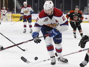 Edmonton's Tomas Soustal battles for the puck during the third period of a WHL game between the Edmonton Oil Kings and the Medicine Hat Tigers at Rogers Place in Edmonton, Alberta on Wednesday, Jan. 24, 2018.