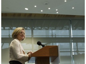 Premier Rachel Notley, along with members of government and industry, answers questions about the Alberta government's up to $1 billion investment in the partial upgrading of oil sands bitumen during a news conference at the Federal Building in Edmonton, Alberta on Monday, Feb. 26, 2018. Photo by Ian Kucerak/Postmedia