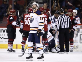 Edmonton Oilers left wing Patrick Maroon (19) looks at the scoreboard after a goal by Arizona Coyotes center Christian Dvorak on Saturday, Feb. 17, 2018, in Glendale, Ariz.