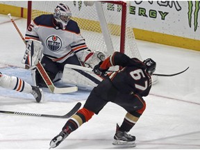 Anaheim Ducks center Rickard Rakell (67) puts the puck past Edmonton Oilers goalie Al Montoya (35) in the first period of an NHL hockey game in Anaheim, Calif., Sunday, Feb. 25, 2018.