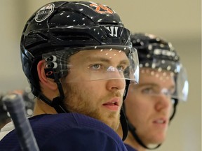 Edmonton Oilers forwards Leon Draisaitl (left) and Connor McDavid at team practice in Edmonton on Feb. 6, 2018.